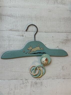 vintage 1930s to 1940s Art Deco wooden child's clothes hanger and baby rattle